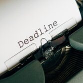 Typewriter with paper showing Deadline
