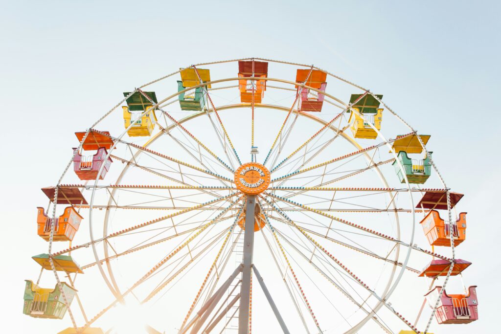 Ferris wheel against blue sky