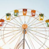 Ferris wheel against blue sky